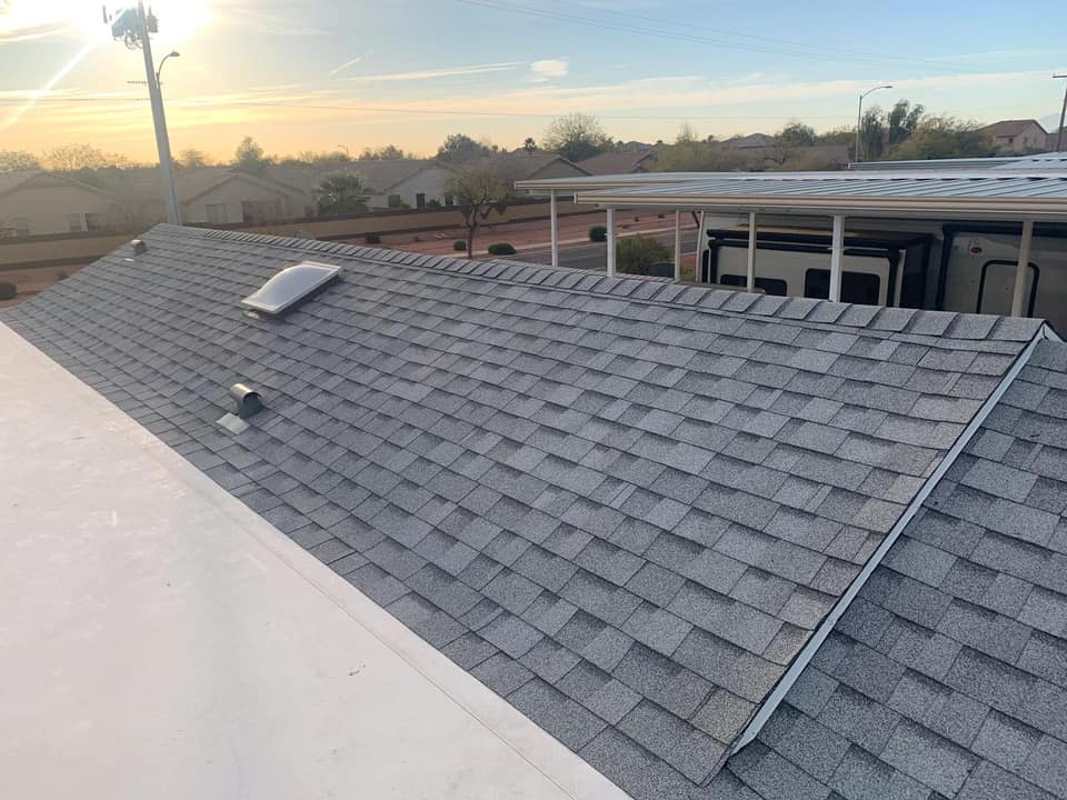 Integrity Roofing repairing a damaged roof